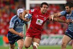 BRISBANE, AUSTRALIA - JULY 02: Rod Davies of the Reds runs in attack during the Super Rugby Semi Final match between the Reds and the Blues at Suncorp Stadium on July 2, 2011 in Brisbane, Australia.  (Photo by Jonathan Wood/Getty Images)