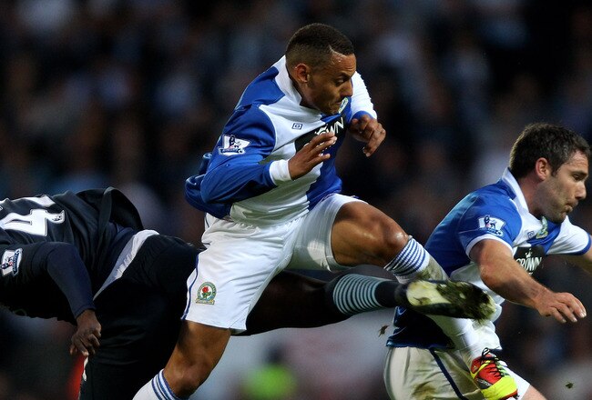 BLACKBURN, ENGLAND - APRIL 25:  Jermaine Jones and David Dunn (R) of Blackburn Rovers tangle with Yaya Toure of Manchester City during the Barclays Premier League match between Blackburn Rovers and Manchester City at Ewood Park on April 25, 2011 in Blackburn, England. (Photo by Clive Brunskill/Getty Images)
