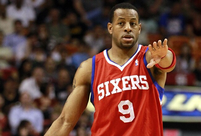 MIAMI, FL - MARCH 25:  Guard Andr Iguodala #9 of the Philadelphia Sixers brings up the ball against the Miami Heat at American Airlines Arena on March 25, 2011 in Miami, Florida. The Heat defeated the Sixers 111-99. NOTE TO USER: User expressly acknowledges and agrees that, by downloading and/or using this Photograph, User is consenting to the terms and conditions of the Getty Images License Agreement.  (Photo by Marc Serota/Getty Images)