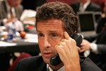 VANCOUVER, BC - JUNE 24:  General manager Doug Wilson of the San Jose Sharks talks on the phone during the 2006 NHL Draft held at General Motors Place on June 24, 2006 in Vancouver, Canada.   (Photo by Bruce Bennett/Getty Images)