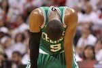 MIAMI, FL - MAY 01:  Rajon Rondo #9  of the Boston Celtics looks on  during Game One of the Eastern Conference Semifinals of the 2011 NBA Playoffs against the Miami Heat at American Airlines Arena on May 1, 2011 in Miami, Florida. NOTE TO USER: User expressly acknowledges and agrees that, by downloading and/or using this Photograph, User is consenting to the terms and conditions of the Getty Images License Agreement.  (Photo by Mike Ehrmann/Getty Images)