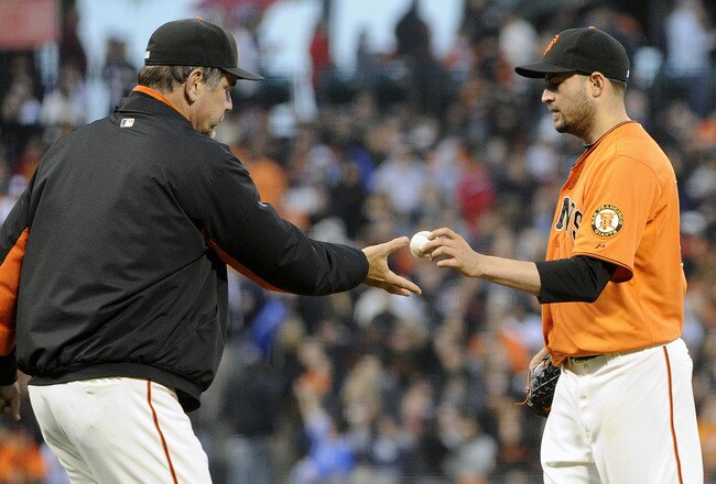 SAN FRANCISCO, CA - JUNE 24: Manager Bruce Bochy #15 of the San Francisco Giants takes the ball from pitcher Jonathan Sanchez #57 against the Cleveland Indians in the fifth inning during a MLB baseball game at AT&T Park June 24, 2011 in San Francisco, California. (Photo by Thearon W. Henderson/Getty Images)