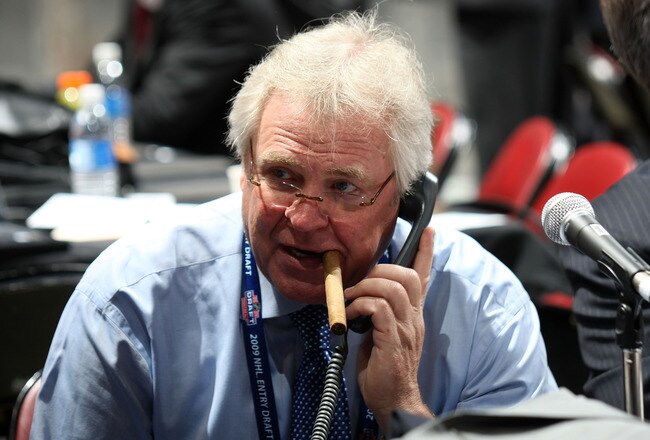 MONTREAL, QC - JUNE 27:  General Manager and President Glen Sather of the New York Rangers works the phones during the 2009 NHL Entry Draft at the Bell Centre on June 27, 2009 in Montreal, Quebec, Canada.  (Photo by Bruce Bennett/Getty Images)