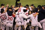 ST LOUIS - OCTOBER 27:  The Boston Red Sox celebrate after defeating the St. Louis Cardinals 3-0 to win game four of the World Series on October 27, 2004 at Busch Stadium in St. Louis, Missouri.  (Photo by Stephen Dunn/Getty Images)