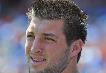 GAINESVILLE, FL - APRIL 9:  Quarterback Tim Tebow watches the Florida Gators Orange and Blue spring football game April 9, 2011 at Ben Hill Griffin Stadium at Gainesville, Florida.  (Photo by Al Messerschmidt/Getty Images)