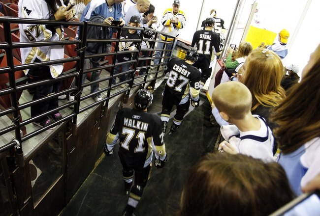 PITTSBURGH, PA - OCTOBER 07:  Evgeni Malkin #71, Sidney Crosby #87 and Jordan Staal #11 of the Pittsburgh Penguins take the ice for warmups before their game against the Phoenix Coyotes at Mellon Arena on October 07, 2009 in Pittsburgh, Pennsylvania.  (Photo by Justin K. Aller/Getty Images)