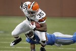 DETROIT - AUGUST 28: Jerome Harrison #35 of the Cleveland Browns tries to escape the tackle of Dre Bly #32 of the Detroit Lions during preseason game on August 28, 2010 at Ford Field in Detroit, Michigan.  (Photo by Gregory Shamus/Getty Images)
