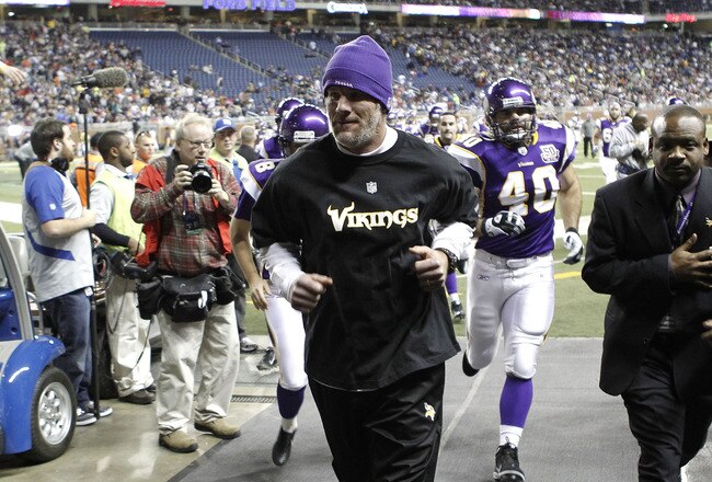 DETROIT, MI - DECEMBER 13:  Brett Favre #4 of the Minnesota Vikings runs off the field prior to playing the New York Giants at Ford Field on December 13, 2010 in Detroit, Michigan.  (Photo by Gregory Shamus/Getty Images)