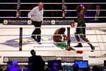 HAMBURG, GERMANY - JULY 02:  Ola Afolabi of England (R) knocks out Terry Dunstan of England during their cruiserweight bout at the Imtech Arena on July 2, 2011 in Hamburg, Germany.  (Photo by Scott Heavey/Getty Images)