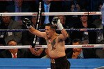 ARLINGTON, TX - NOVEMBER 13:  Brandon Rios (brown trunks) celebrates after he won his match against Omri Lowther during their Super Lightweight bout at Cowboys Stadium on November 13, 2010 in Arlington, Texas.  (Photo by Tom Pennington/Getty Images)