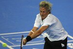 BELFAST, UNITED KINGDOM - FEBRUARY 21:  Bjorn Borg of Sweden in action against Jeremy Bates of England during the BlackRock Tour of Champions at the Odyssey Arena on February 21, 2008 in Belfast, Northern Ireland.  (Photo by Matthew Lewis/Getty Images)