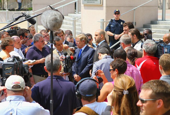 ST. LOUIS, MO - JUNE 3: Theodore Olson (C), lawyer for the National Football League Players Association (NFLPA), addresses the media outside the Thomas F. Eagleton U.S. Federal Courthouse after the NFL lockout hearing on June 3, 2011 in St. Louis, Missouri. NFL players and the league met in court today for a federal appeals hearing on the legality of the three-month-old lockout.  (Photo by Dilip Vishwanat/Getty Images)