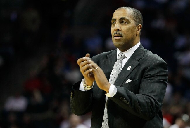 CHARLOTTE, NC - MARCH 18:  Head coach Lorenzo Romar of the Washington Huskies reacts in the second half while taking on the Georgia Bulldogs during the second round of the 2011 NCAA men's basketball tournament at Time Warner Cable Arena on March 18, 2011 in Charlotte, North Carolina.  (Photo by Kevin C. Cox/Getty Images)