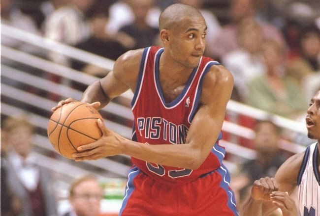 27 Nov 1995:  Forward Grant Hill of the Detroit Pistons moves the ball during a game against the Orlando Magic at the Orlando Arena in Orlando, Florida.  The Magic won the game, 96-95. Mandatory Credit: ALLSPORT USA  /Allsport Mandatory Credit: ALLSPORT U