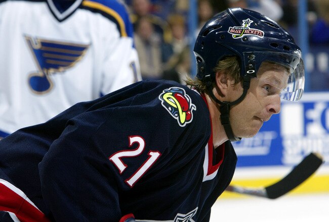 ST. LOUIS - OCTOBER 17:  Center Espen Knutsen #21 of the Columbus Blue Jackets looks on against the St. Louis Blues during the NHL game on October 17, 2002 at the Savvis Center in St. Louis, Missouri.  The Blues won 7-1. (Photo by Elsa/Getty Images/NHLI)