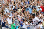 NEW YORK, NY - JULY 09:  Derek Jeter #2 of the New York Yankees rounds the bases after hitting a solo home run in the third inning for career hit 3000 while playing against the Tampa Bay Rays at Yankee Stadium on July 9, 2011 in the Bronx borough of New York City.  (Photo by Michael Heiman/Getty Images)