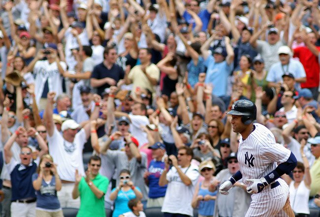 NEW YORK, NY - JULY 09:  Derek Jeter #2 of the New York Yankees rounds the bases after hitting a solo home run in the third inning for career hit 3000 while playing against the Tampa Bay Rays at Yankee Stadium on July 9, 2011 in the Bronx borough of New York City.  (Photo by Michael Heiman/Getty Images)