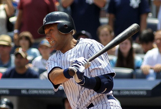 NEW YORK, NY - JULY 09:  Derek Jeter #2 of the New York Yankees hits a single for career hit 2999 while playing against the Tampa Bay Rays at Yankee Stadium on July 9, 2011 in the Bronx borough of New York City.  (Photo by Michael Heiman/Getty Images)
