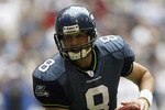 IRVING, TX - OCTOBER 27:  Quarterback Matt Hassellbeck #8 of the Seattle Seahawks carries the ball during the game against the Dallas Cowboys on October 27, 2002 at Texas Stadium in Irving, Texas. The Seahawks won 17-14. (Photo by Stephen Dunn/Getty Images)