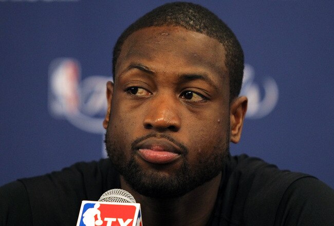 DALLAS, TX - JUNE 04:  Dwyane Wade of the Miami Heat answers questions from the press at a media availablity session prior to Game 3 of the 2011 NBA Finals at the American Airlines Center on June 4, 2011 in Dallas, Texas. NOTE TO USER: User expressly acknowledges and agrees that, by downloading and or using this photograph, User is consenting to the terms and conditions of the Getty Images License Agreement.  (Photo by Chris Chambers/Getty Images)