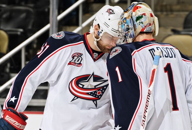 PITTSBURGH, PA - FEBRUARY 8:  Rick Nash #61 of the Columbus Blue Jackets congratulates goaltender Steve Mason #1 of the Columbus Blue Jackets after Columbus defeated the Pittsburgh Penguins 4-1 on February 8, 2011 at CONSOL Energy Center in Pittsburgh, Pennsylvania.  (Photo by Jamie Sabau/Getty Images)