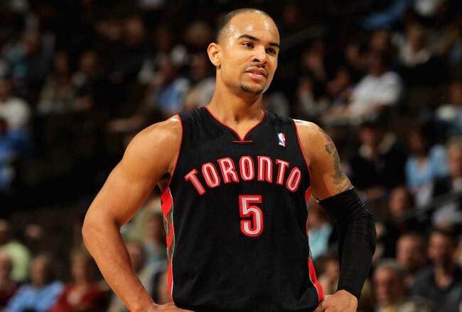 DENVER, CO - MARCH 21:  Jerryd Bayless #5 of the Toronto Raptors looks on during a break in the action against the Denver Nuggets at the Pepsi Center on March 21, 2011 in Denver, Colorado. The Nuggets defeated the Raptors 123-90. NOTE TO USER: User expressly acknowledges and agrees that, by downloading and or using this photograph, User is consenting to the terms and conditions of the Getty Images License Agreement.  (Photo by Doug Pensinger/Getty Images)