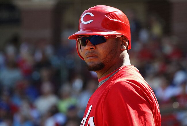 SURPRISE, AZ - MARCH 11:  Juan Francisco #64 of the Cincinnati Reds waits to bat during the third inning of the spring training game against the Texas Rangers at Surprise Stadium on March 11, 2011 in Surprise, Arizona.  (Photo by Christian Petersen/Getty Images)
