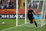 DRESDEN, GERMANY - JULY 10:  Abby Wambach of USA celebrates after scoring her team's equalizing goal during the FIFA Women's World Cup 2011 Quarter Final match between Brazil and USA at Rudolf-Harbig-Stadion on July 10, 2011 in Dresden, Germany.  (Photo by Martin Rose/Getty Images)