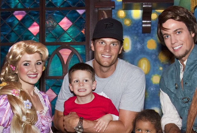 ANAHEIM, CA - APRIL 21:  In this handout photo provided by Disney Parks, New England Patriots Quarterback Tom Brady, his son Jack (4) and niece Jordan (5), meet Rapunzel and Flynn Rider of Disney's animated film, 'Tangled,' while celebrating Jordan's fifth birthday April 21, 2011 at Disneyland in Anaheim, California.  (Photo by Paul Hiffmeyer/Disney Parks via Getty Images)