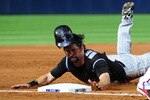 ATLANTA - JULY 6: Todd Helton #17 of the Colorado Rockies dives in to 3rd base on a double steal attempt against the Atlanta Braves at Turner Field on July 6, 2011 in Atlanta, Georgia. (Photo by Scott Cunningham/Getty Images)