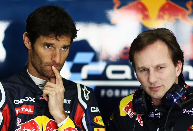 VALENCIA, SPAIN - FEBRUARY 02:  Mark Webber of Australia and Red Bull Racing talks with his Team Principal Christian Horner as he prepares to drive the new RB7 during day two of winter testing at the Ricardo Tormo Circuit on February 2, 2011 in Valencia, Spain.  (Photo by Paul Gilham/Getty Images)