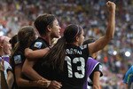 DRESDEN, GERMANY - JULY 10:  Abby Wambach of USA celebrates after scoring her team's equalizing goal during the FIFA Women's World Cup 2011 Quarter Final match between Brazil and USA at Rudolf-Harbig-Stadion on July 10, 2011 in Dresden, Germany.  (Photo by Martin Rose/Getty Images)