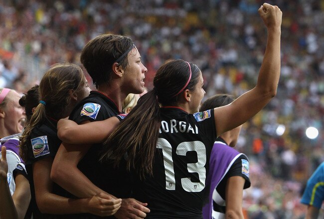 DRESDEN, GERMANY - JULY 10:  Abby Wambach of USA celebrates after scoring her team's equalizing goal during the FIFA Women's World Cup 2011 Quarter Final match between Brazil and USA at Rudolf-Harbig-Stadion on July 10, 2011 in Dresden, Germany.  (Photo by Martin Rose/Getty Images)