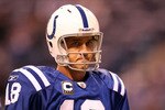 INDIANAPOLIS, IN - JANUARY 08:  Quarterback Peyton Manning #18 of the Indianapolis Colts looks on against the New York Jets during their 2011 AFC wild card playoff game at Lucas Oil Stadium on January 8, 2011 in Indianapolis, Indiana. The Jets won 17-16. (Photo by Andy Lyons/Getty Images)
