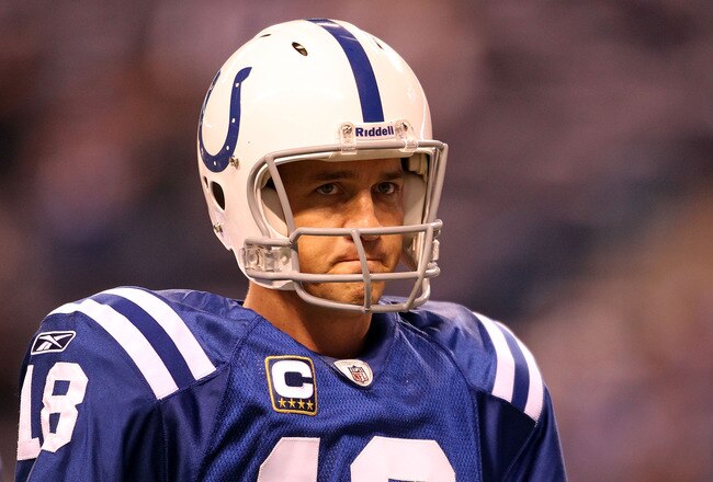 INDIANAPOLIS, IN - JANUARY 08:  Quarterback Peyton Manning #18 of the Indianapolis Colts looks on against the New York Jets during their 2011 AFC wild card playoff game at Lucas Oil Stadium on January 8, 2011 in Indianapolis, Indiana. The Jets won 17-16. (Photo by Andy Lyons/Getty Images)