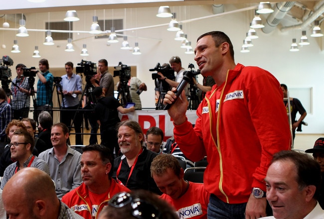 HAMBURG, GERMANY - JUNE 27:  Vitali Klitschko asks a question during the Wladimir Klitschko and David Haye press conference on June 27, 2011 in Hamburg, Germany to preview the heavy weight title fight between them which will be held on the 2nd July 2011 at the Imtech Arena.  (Photo by Scott Heavey/Getty Images)