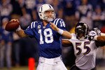 INDIANAPOLIS - JANUARY 16:  Quarterback Peyton Manning #18 of the Indianapolis Colts throws the ball as Terrell Suggs #55 of the Baltimore Ravens rushes in during the AFC Divisional Playoff Game at Lucas Oli Stadium on January 16, 2010 in Indianapolis, Indiana.  (Photo by Jonathan Daniel/Getty Images)