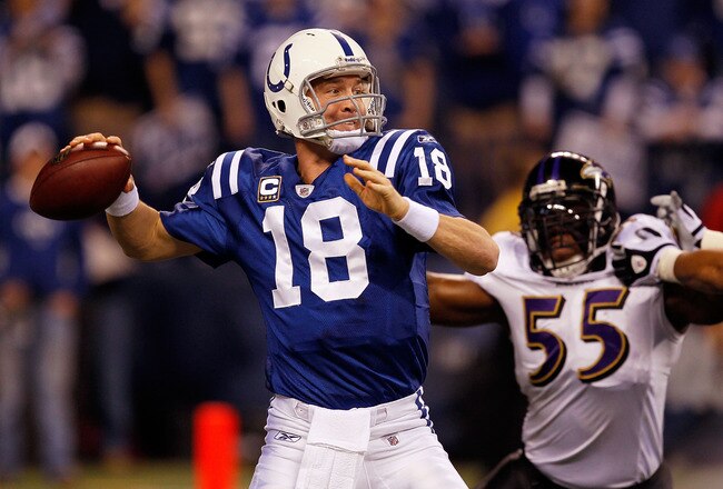 INDIANAPOLIS - JANUARY 16:  Quarterback Peyton Manning #18 of the Indianapolis Colts throws the ball as Terrell Suggs #55 of the Baltimore Ravens rushes in during the AFC Divisional Playoff Game at Lucas Oli Stadium on January 16, 2010 in Indianapolis, Indiana.  (Photo by Jonathan Daniel/Getty Images)