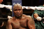 HOLLYWOOD, FL - JANUARY 06:  James 'Lights Out' Toney sits on his stool during his loss to  Samuel 'Nigerian Nightmare' Peter in a WBC heavyweight title eliminator fight at the Hard Rock Hotel and Casino January 6, 2007 in Hollywood, Florida.  (Photo by Marc Serota/Getty Images)