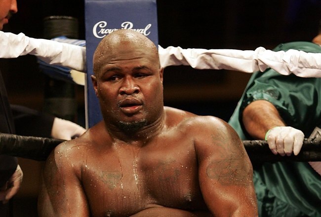HOLLYWOOD, FL - JANUARY 06:  James 'Lights Out' Toney sits on his stool during his loss to  Samuel 'Nigerian Nightmare' Peter in a WBC heavyweight title eliminator fight at the Hard Rock Hotel and Casino January 6, 2007 in Hollywood, Florida.  (Photo by Marc Serota/Getty Images)