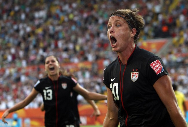 DRESDEN, GERMANY - JULY 10:  Abby Wambach of USA celebrates after scoring her team's equalizing goal during the FIFA Women's World Cup 2011 Quarter Final match between Brazil and USA at Rudolf-Harbig-Stadion on July 10, 2011 in Dresden, Germany.  (Photo by Martin Rose/Getty Images)