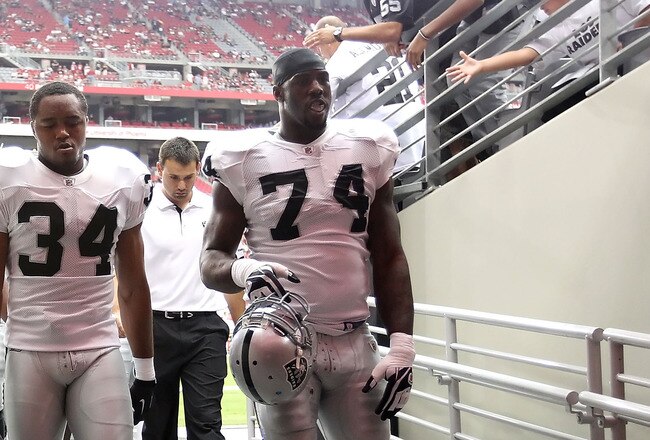 GLENDALE, AZ - SEPTEMBER 26:  (L-R) Marcel Reece #45, Mike Mitchell #34 and Bruce Campbell #73 of the Oakland Raiders before the NFL game against the Arizona Cardinals at the University of Phoenix Stadium on September 26, 2010 in Glendale, Arizona.  The Cardinals defeated the Raiders 24-23.  (Photo by Christian Petersen/Getty Images)