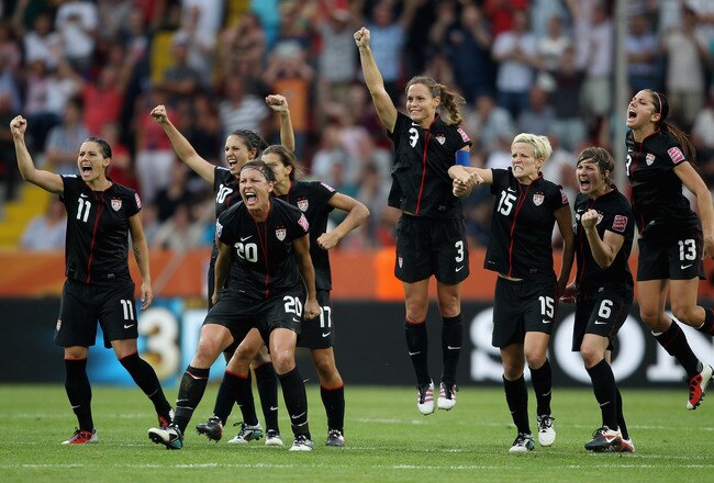 DRESDEN, GERMANY - JULY 10:  The USA team celebrate during the penalty shoot out during the Women's World Cup Quarter Final match between Brazil and USA at Rudolf-Harbig Stadium on July 10, 2011 in Dresden, Germany.  (Photo by Scott Heavey/Getty Images)