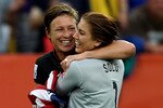 DRESDEN, GERMANY - JULY 10:  Hope Solo of USA (R) celebrates with Abby Wambach after victory in the penalty shoot out during the Women's World Cup Quarter Final match between Brazil and USA at Rudolf-Harbig Stadium on July 10, 2011 in Dresden, Germany.  (Photo by Scott Heavey/Getty Images)