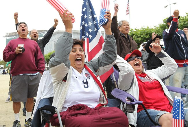SAN FRANCISCO, CA - JULY 13:  Soccer fans celebrate while watching a live telecast of the U.S. women's soccer World Cup semi-final game against France on July 13, 2011 in San Francisco, California.  Hundreds of people watched a live telecast of the U.S. women's soccer team in a semi-final game against France. The U.S. defeated France 3-1 and will advance to the World Cup final game in Frankfurt Germany on Sunday.  (Photo by Justin Sullivan/Getty Images)