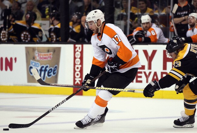 BOSTON, MA - MAY 04:  Jeff Carter #17 of the Philadelphia Flyers tries to keep the puck from Michael Ryder #73 of the Boston Bruins in Game Three of the Eastern Conference Semifinals during the 2011 NHL Stanley Cup Playoffs at TD Garden on May 4 , 2011 in Boston, Massachusetts.  (Photo by Elsa/Getty Images)