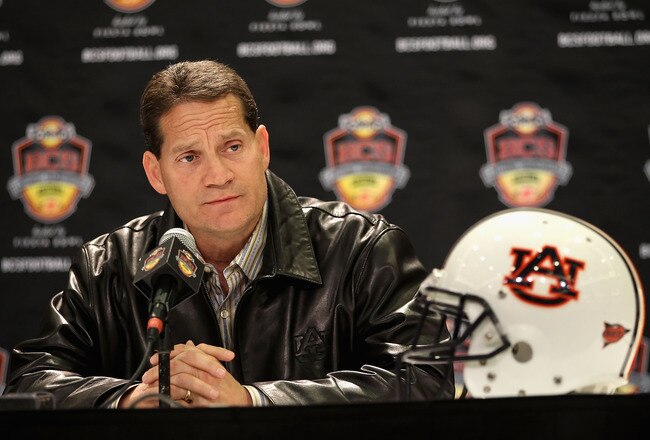 SCOTTSDALE, AZ - JANUARY 11:  Head coach Gene Chizik of the Auburn Tigers speaks to the media during a press conference for the Tostitos BCS National Championship Game at the JW Marriott Camelback Inn on January 11, 2011 in Scottsdale, Arizona.  (Photo by Christian Petersen/Getty Images)