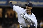 SAN DIEGO, CA-JUNE 3: Mike Adams #37 of the San Diego Padres pitches during the seventh inning of a baseball game against the Houston Astros at Petco Park on June 3, 2011 in San Diego, California.  (Photo by Denis Poroy/Getty Images)