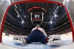 OTTAWA, CANADA - MARCH 25:  Semyon Varlamov #1 of the Washington Capitals stretches during a timeout in a game agaisnt the Ottawa Senators at Scotiabank Place on March 25, 2011 in Ottawa, Canada.  (Photo by Phillip MacCallum/Getty Images)