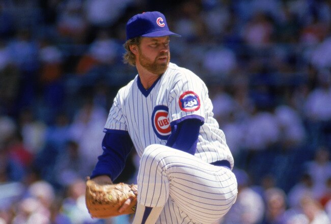 CHICAGO - 1987:  Rick Sutcliffe #40 of the Chicago Cubs winds back to pitch during a game in the 1987 season at Wrigley Field in Chicago, Illinois . ( Photo by: Jonathan Daniel/ Getty Images )